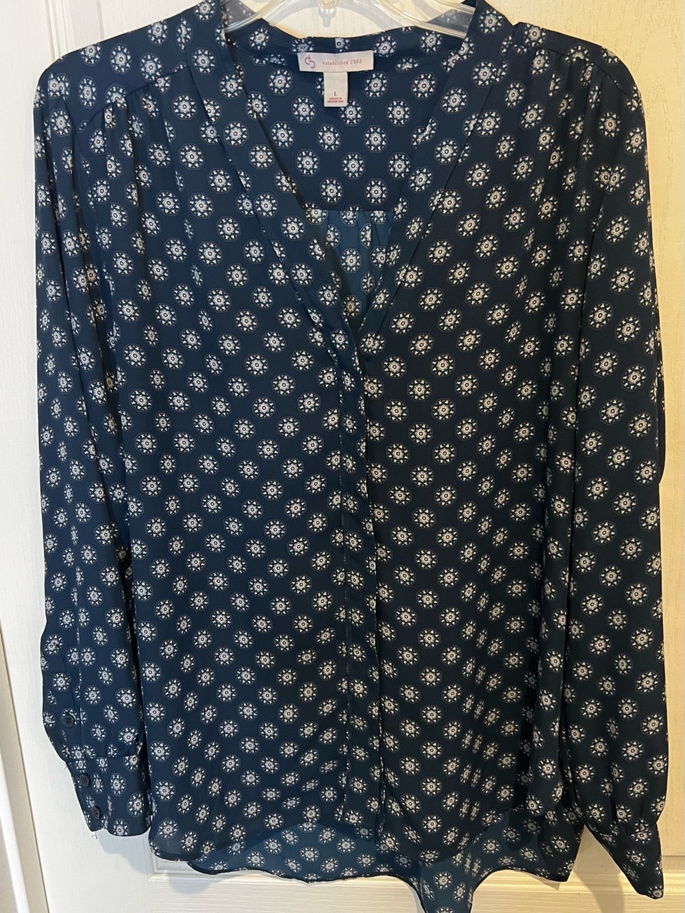 Dress Barn Navy Blouse with White Sunburst Print